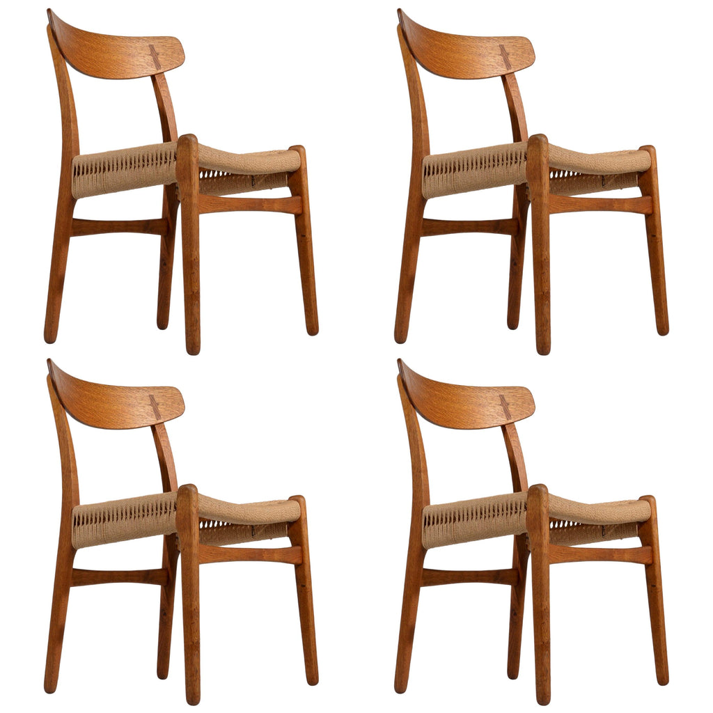 Set of four early Hans Wegner CH23 oak dining chairs for Carl Hansen and Son