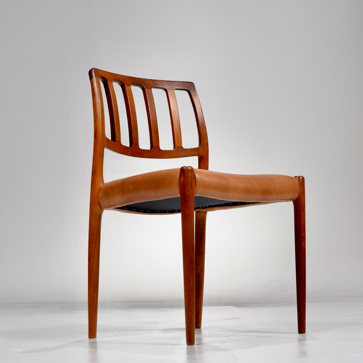 Niels Otto Møller Model 83 teak and leather dining chair detail 5