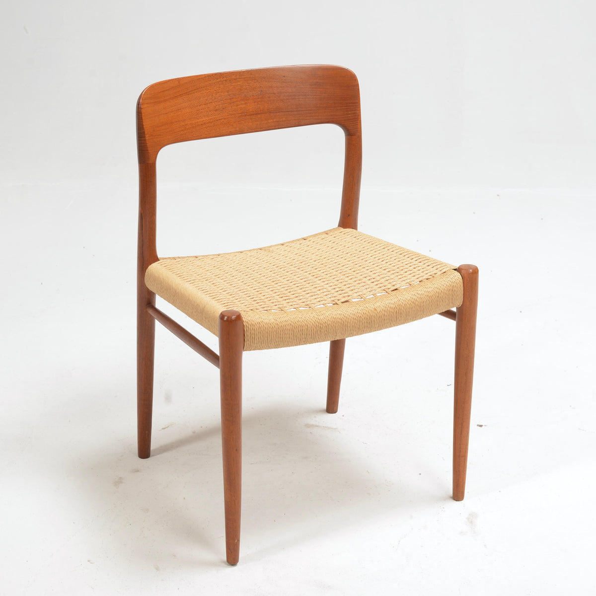 Niels Otto Møller Model 75 teak and paper cord dining chair detail 2