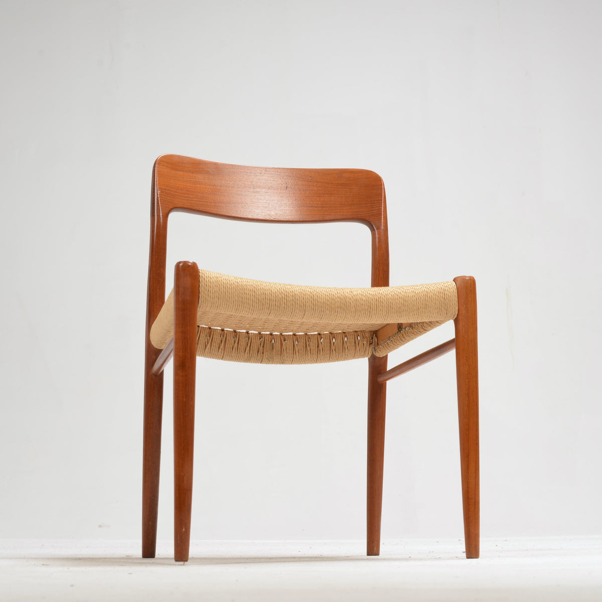 Niels Otto Møller Model 75 teak and paper cord dining chair detail 14