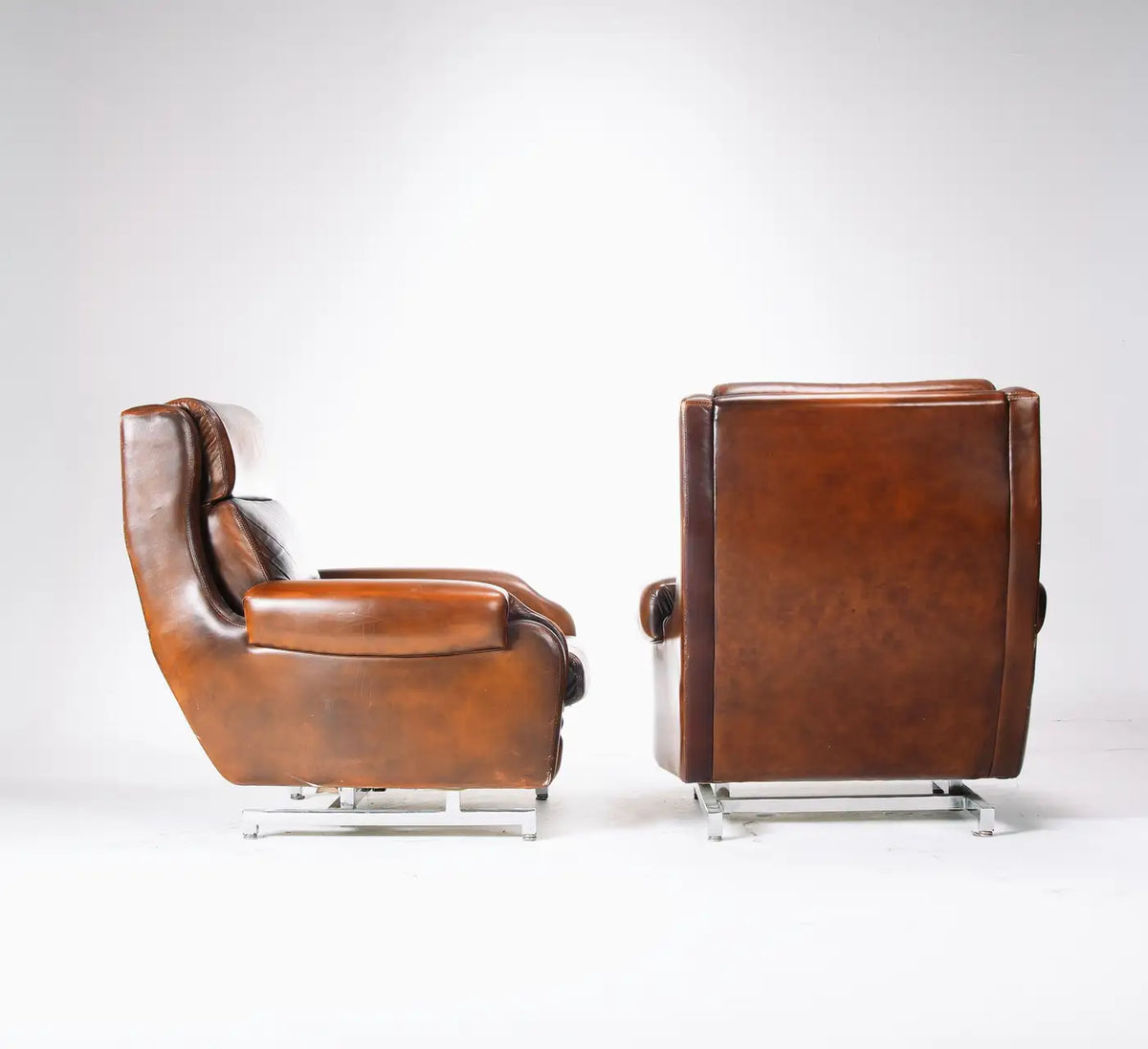 French Leather and Chrome Recliners - Two Available