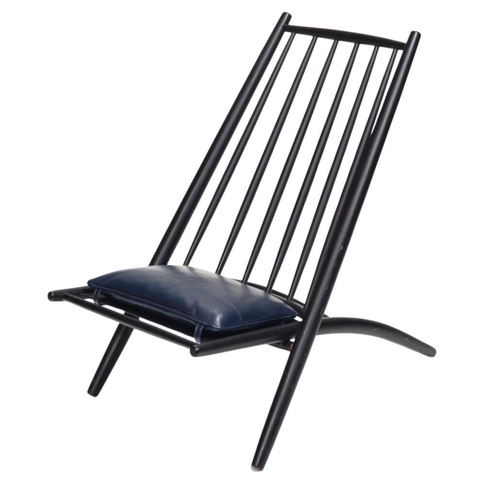 Ilmari Tapiovaara Congo lounge chair in black lacquer with blue leather cushion