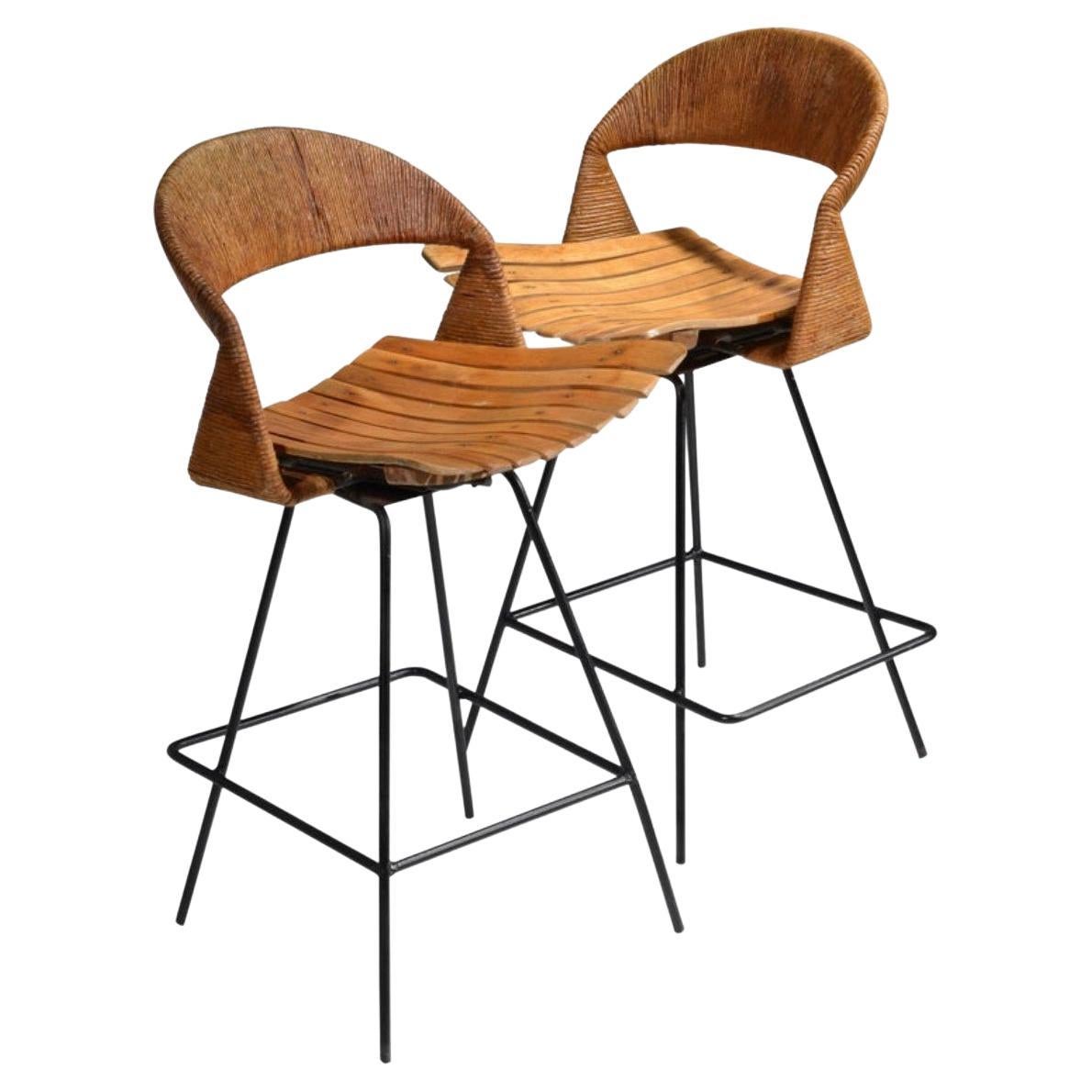 Pair of Arthur Umanoff birch jute and steel swivel bar stools