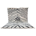 Moroccan Boujaad wool rug with graphic black and white stripes
