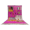 Moroccan Boujaad wool rug with vivid pink background and geometric designs
