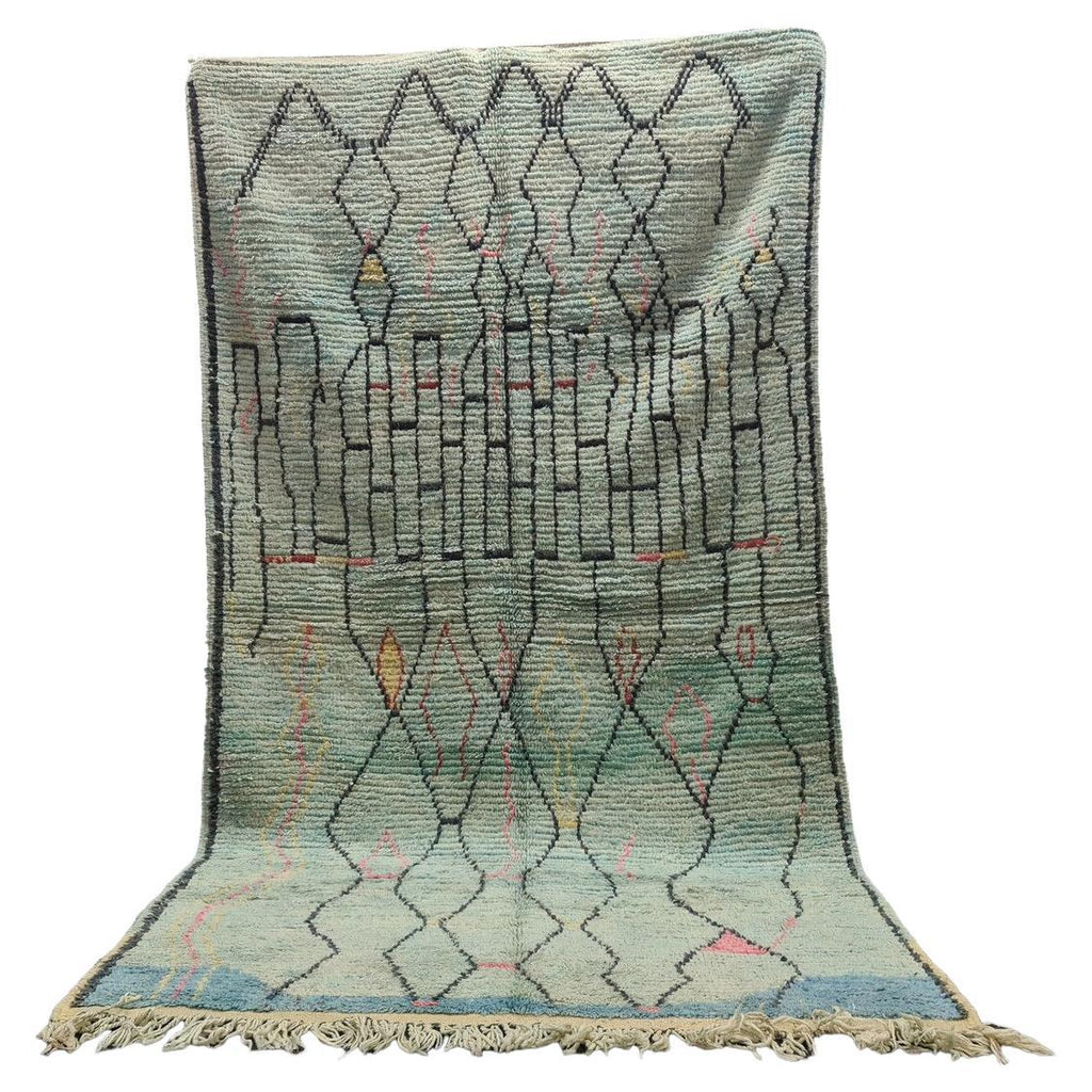 Moroccan Boujaad wool rug in faded blue with abstract geometric patterns