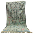 Moroccan Boujaad wool rug in faded blue with abstract geometric patterns