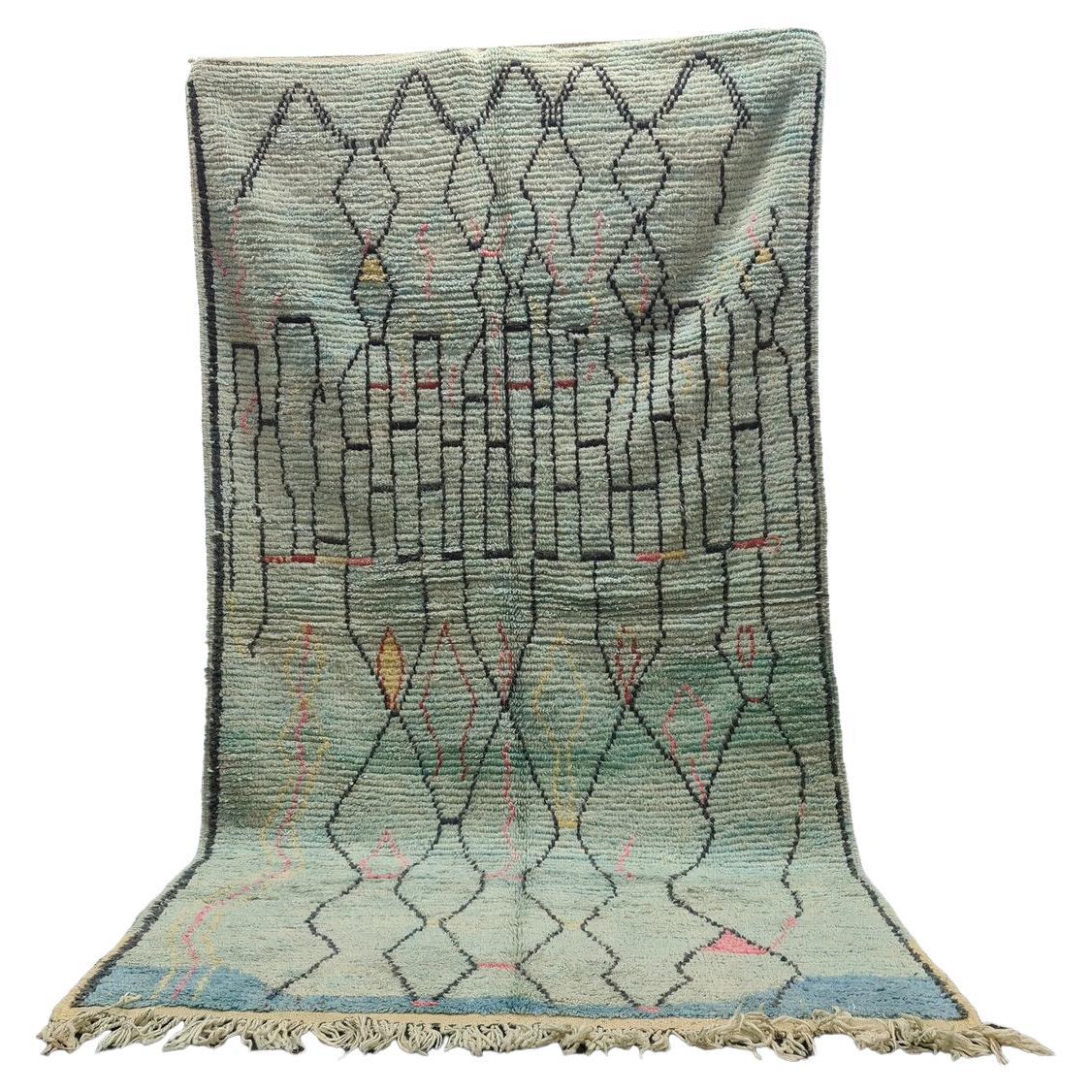 Moroccan Boujaad wool rug in faded blue with abstract geometric patterns