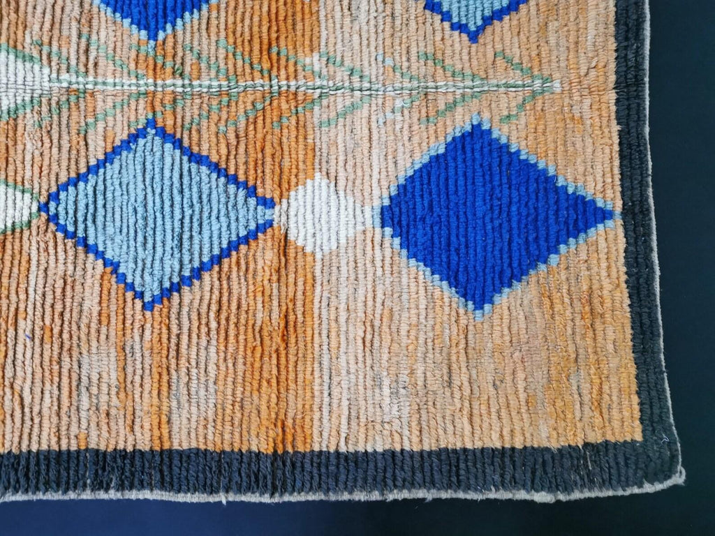 Moroccan Boujaad orange and blue geometric wool rug detail 10