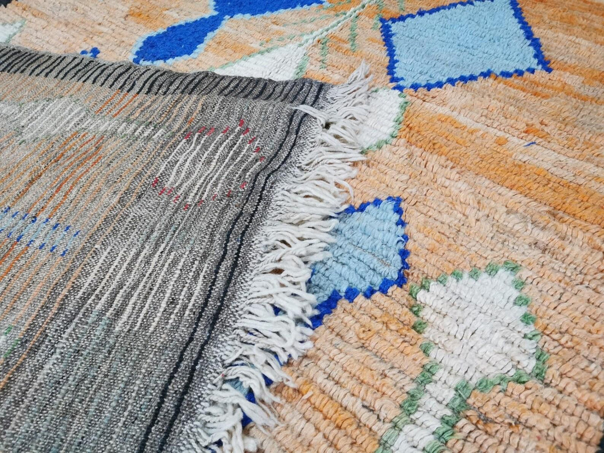Moroccan Boujaad orange and blue geometric wool rug detail 6