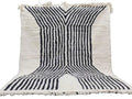 Moroccan Boujaad wool rug in white with directional black stripes